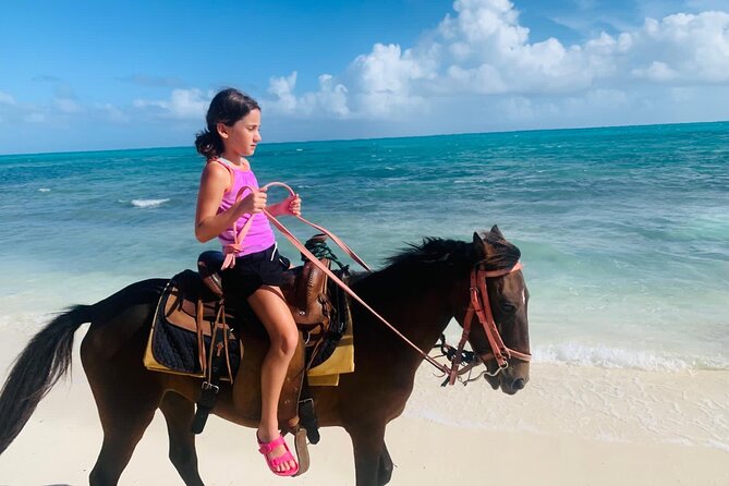 60-Minute Private Horseback Riding Experience in Turks and Caicos - Photos and celebration bouquets: nice extras, but confirm details