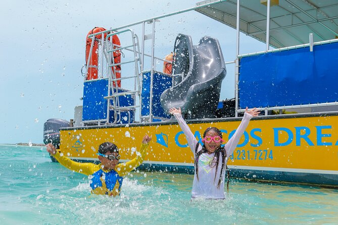 Afternoon Half Day Cruise from Providenciales with Snorkeling and Iguana Island - Boat Slide and Jump Platform Time in Turquoise Water