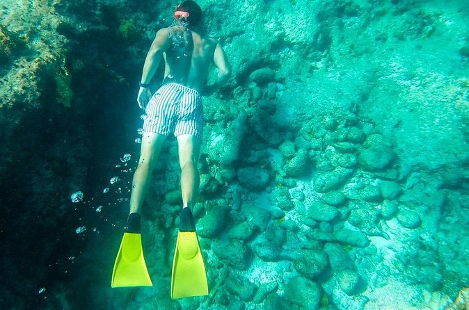 All Day Adventure with a Beach BBQ Feast from Providenciales - The captain and crew vibe: Jules, Michael, and island music