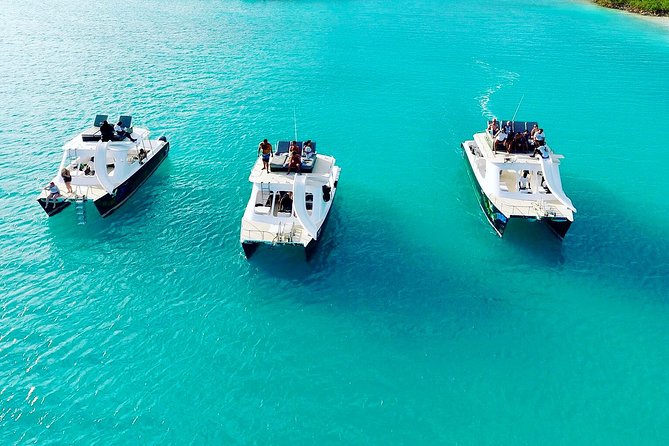 Full Day Beach BBQ Lunch & Snorkeling Excursion in Grace Bay - Onboard Fun: The Slide and Jump Board Between Swim Stops