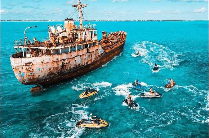 Jet Skiing around La famille ship and smaller pristine cays - Price and value: $350 per group up to 2, plus transport and tips