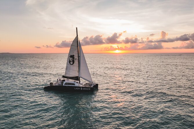 Lady Grace Signature Catamaran Sunset Sail from Ritz-Carlton - Sunset Timing by Season and How the Cruise Typically Feels