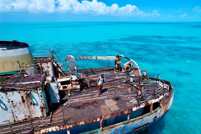 Let me take you to Caicos Jetski safari Private Tour - Stop 1: La Famille Express Shipwreck and the 15–20 Foot Jump