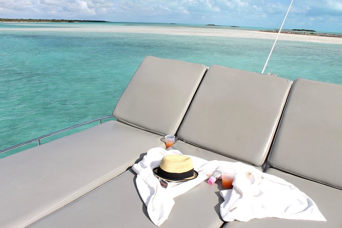 Private 4 Hour Power Catamaran Excursion in Grace Bay - Reef time and conch spotting: snorkeling that feels guided, not chaotic