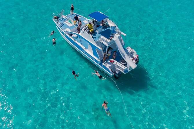 Private 7-Hour Catamaran Tour in Turks and Caicos - Half Moon Bay: the BBQ, the rum punch, and real beach time
