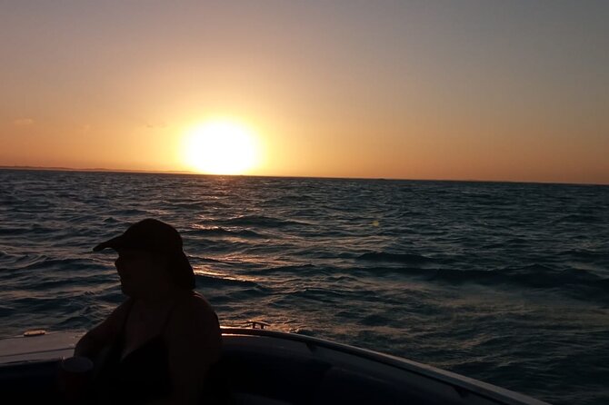 Private Catamaran Sunset Cruise in Turks and Caicos - Sailing the Grace Bay shoreline at golden hour