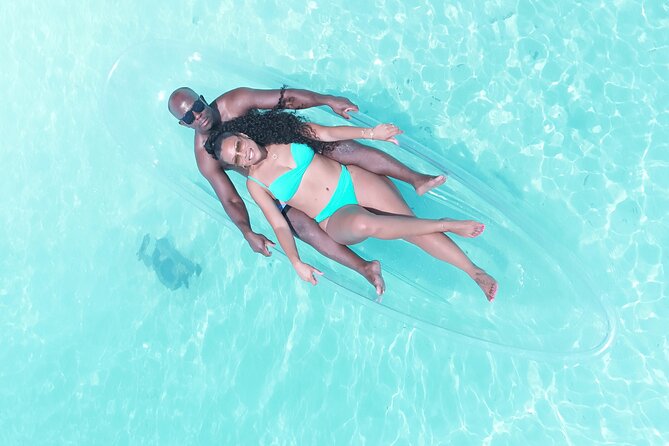Romantic Clear Kayak Drone Photoshoot for Couples Turks & Caicos - Transparent kayak + shallow turquoise: the magic of this setup