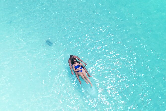 Romantic Clear Kayak Drone Photoshoot for Couples Turks & Caicos - Comfort and effort: clear kayak fun with some real handling