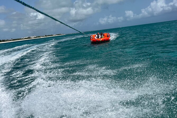 Tubing on grace bay beach Turks and caicos islands - Safety without the scare factor: life jackets and comfort level