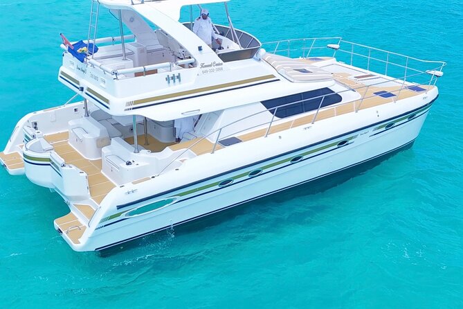 Turks and Caicos Full-Day Luxury Private Yacht Charter - Anchor stops, beach time, and the floating party island